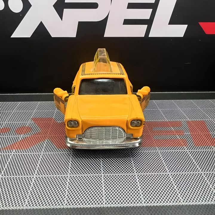 Carro Taxi Amarillo Juguete Coleccionable De Cuerda