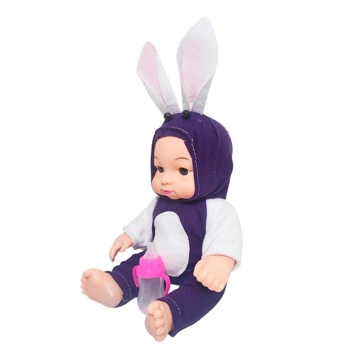 Muñeco Bebe Con Tetero Y Pijama En Bolso Juguete Niñas