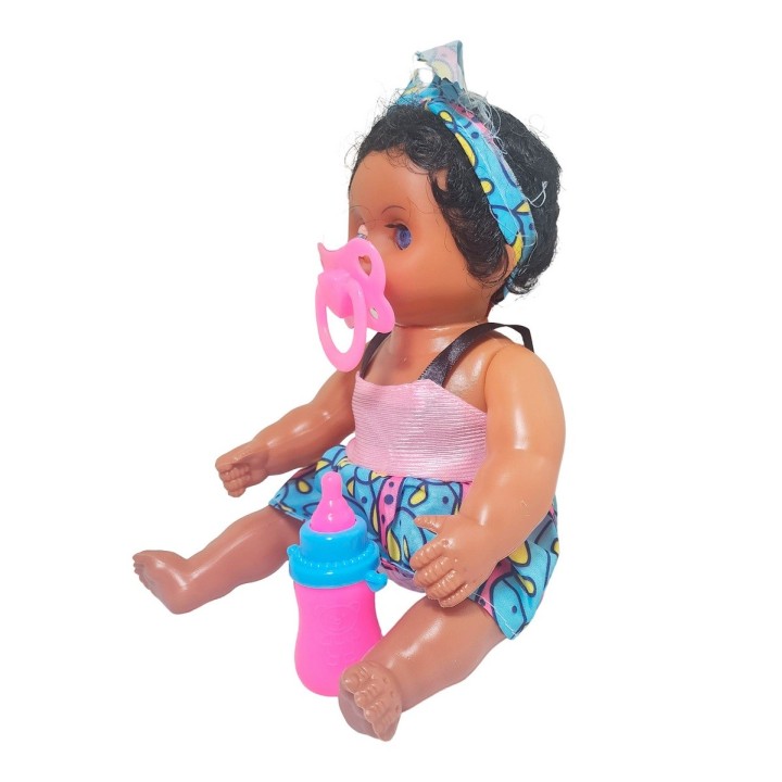 Muñeca Con Vestido Color Bebe Tetero En Bolso Juguete Niñas